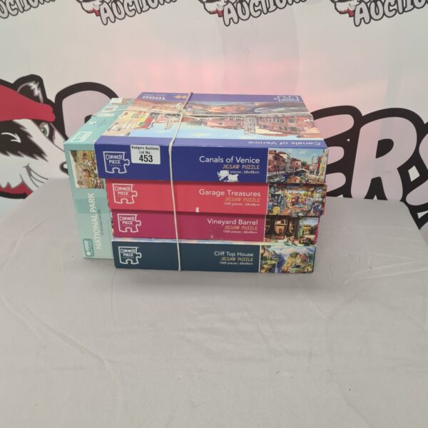 Vintage jigsaw puzzle lot with corner pieces for collectors.