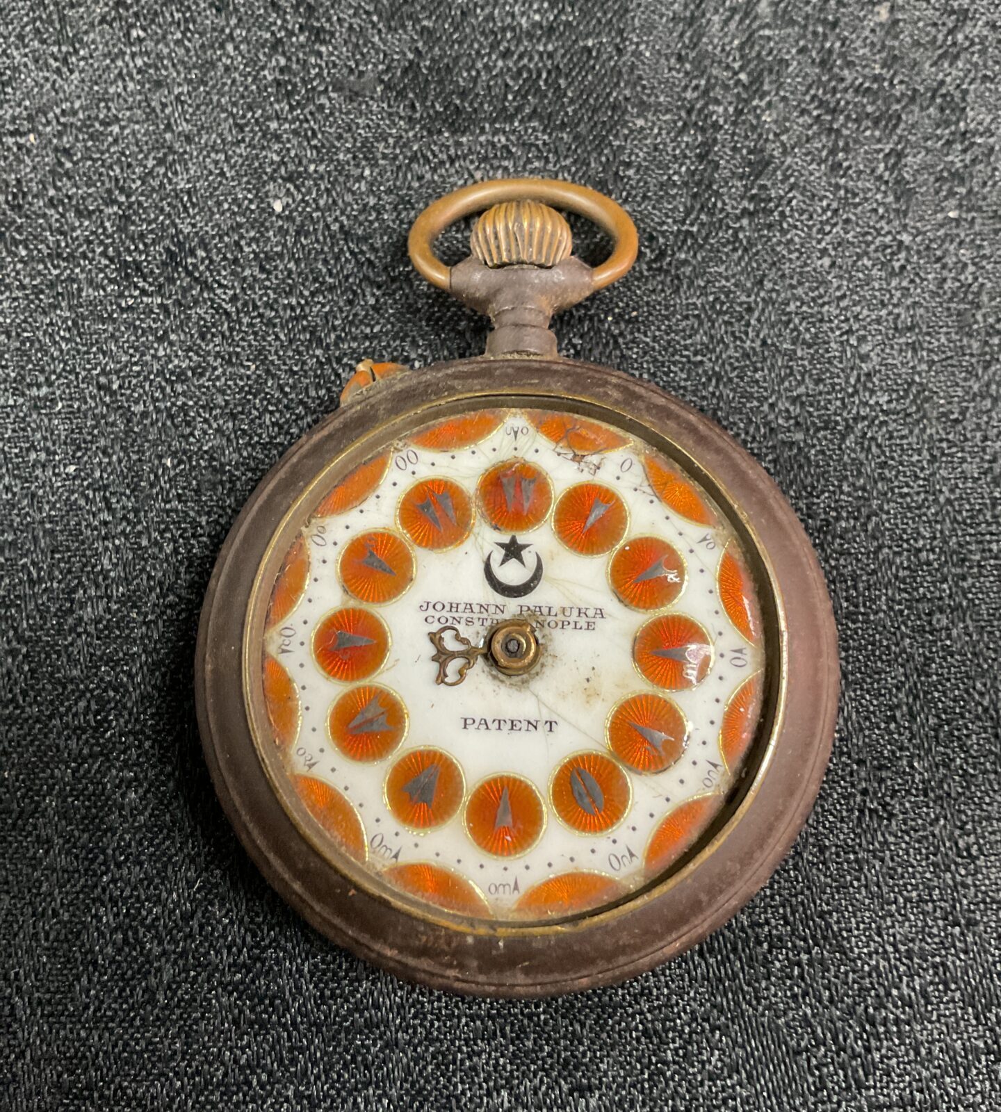 Antique Johann Paluka pocket watch with decorative dial.