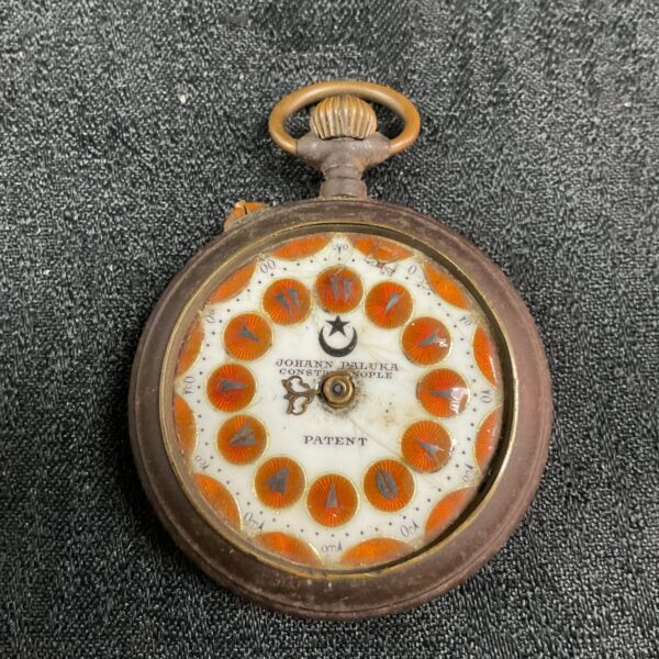 Antique Johann Paluka pocket watch with decorative dial.