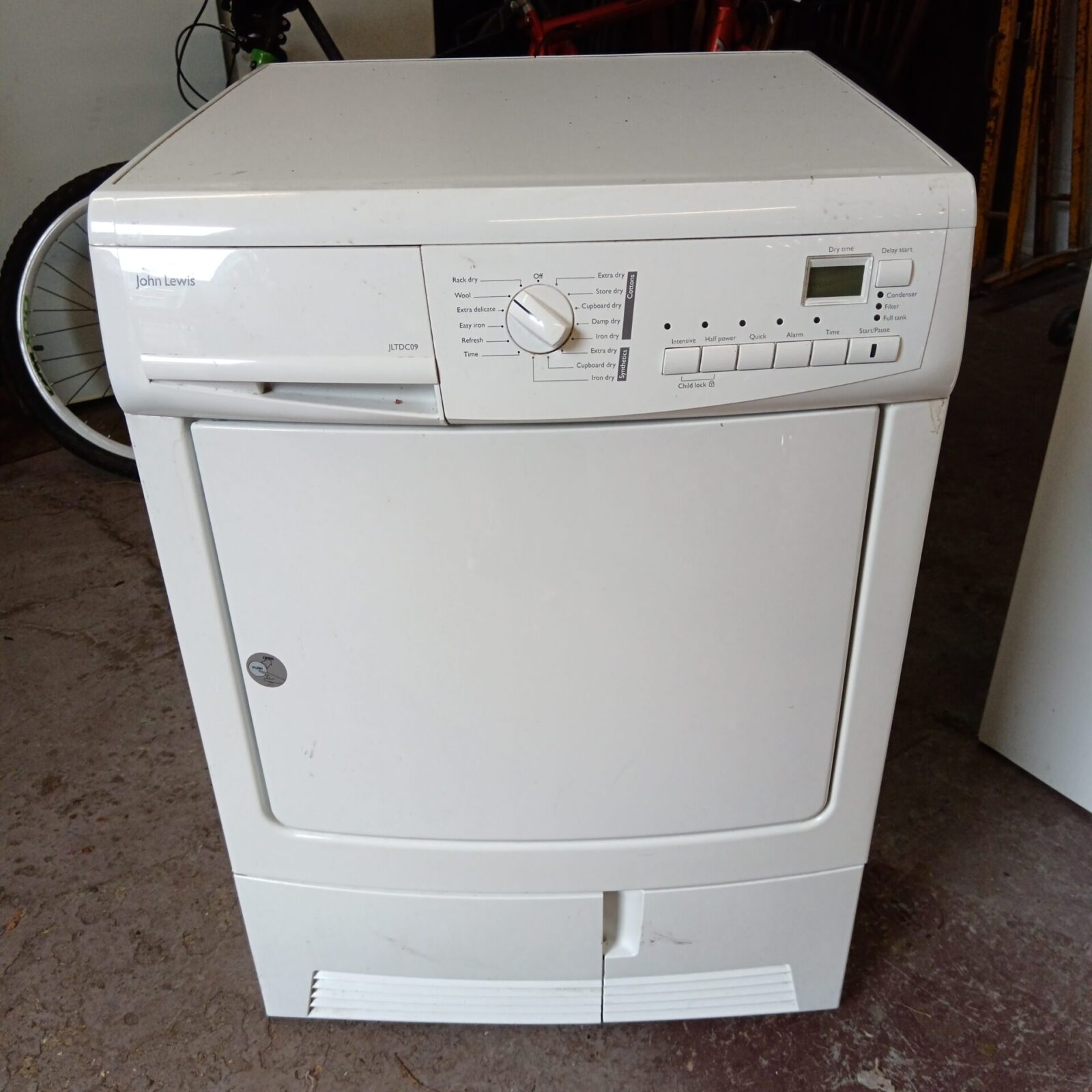 White John Lewis jltdc09 condenser tumble dryer for laundry.