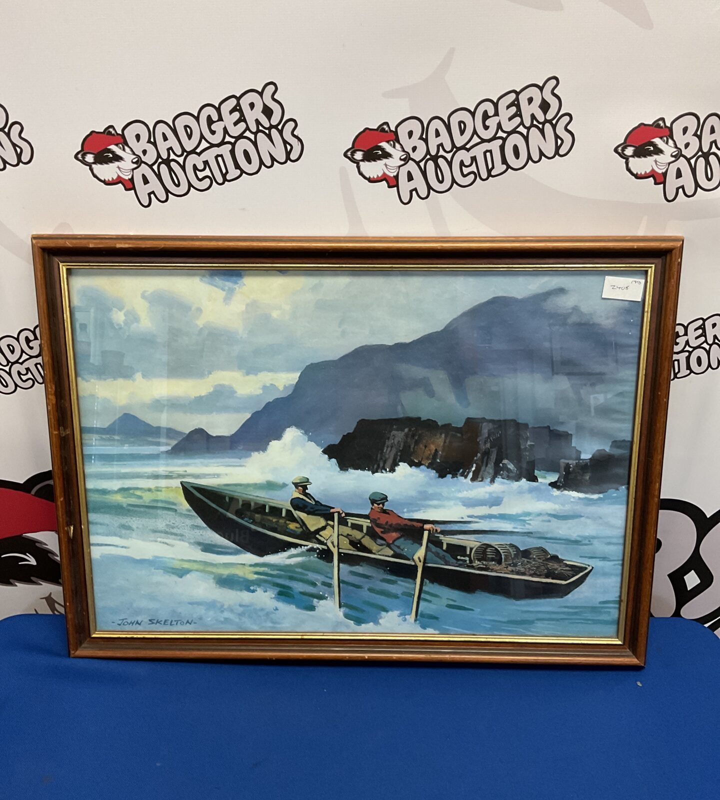 Vintage John Skelton print of men in a kayak at sea.