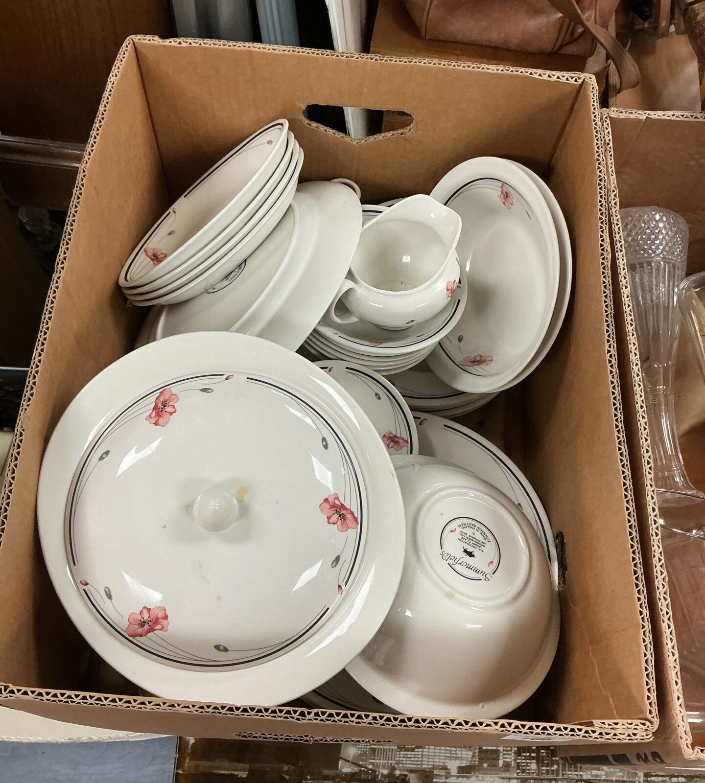 Vintage Johnson Bros dinner service with floral design.