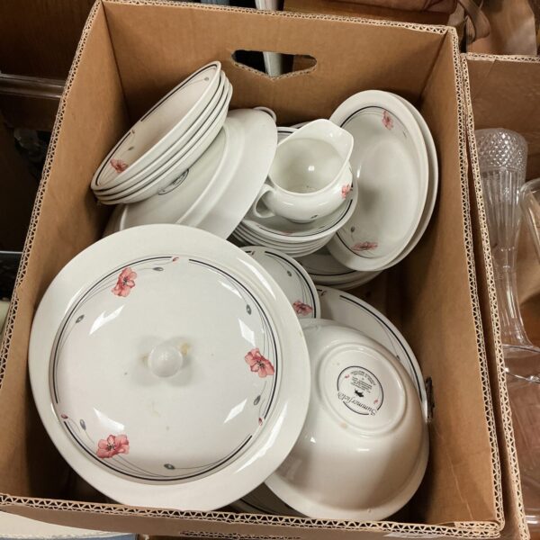 Vintage Johnson Bros dinner service with floral design.