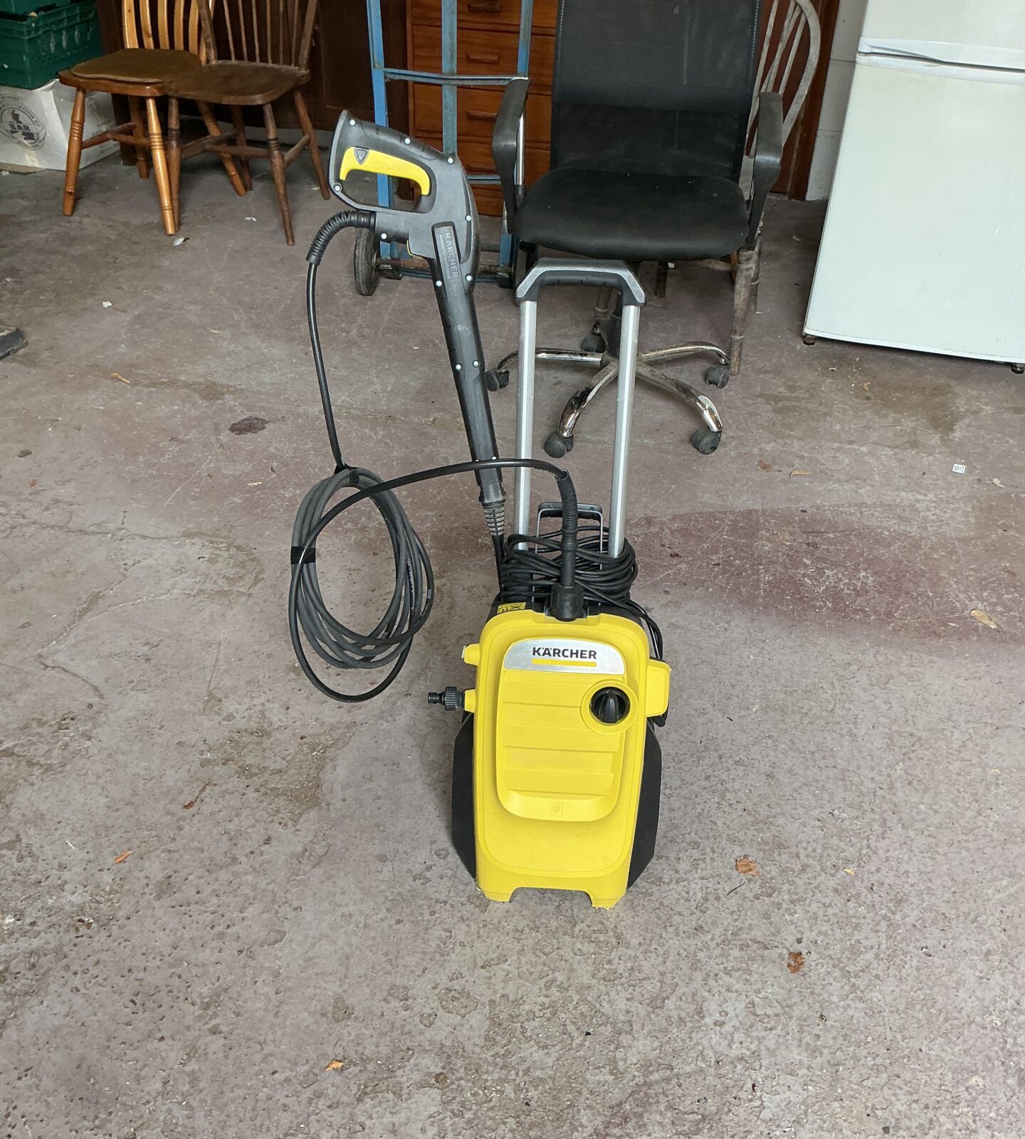 Front view of a Karcher power washer for garden and patio cleaning.