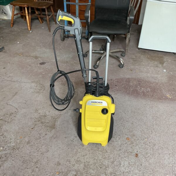 Front view of a Karcher power washer for garden and patio cleaning.
