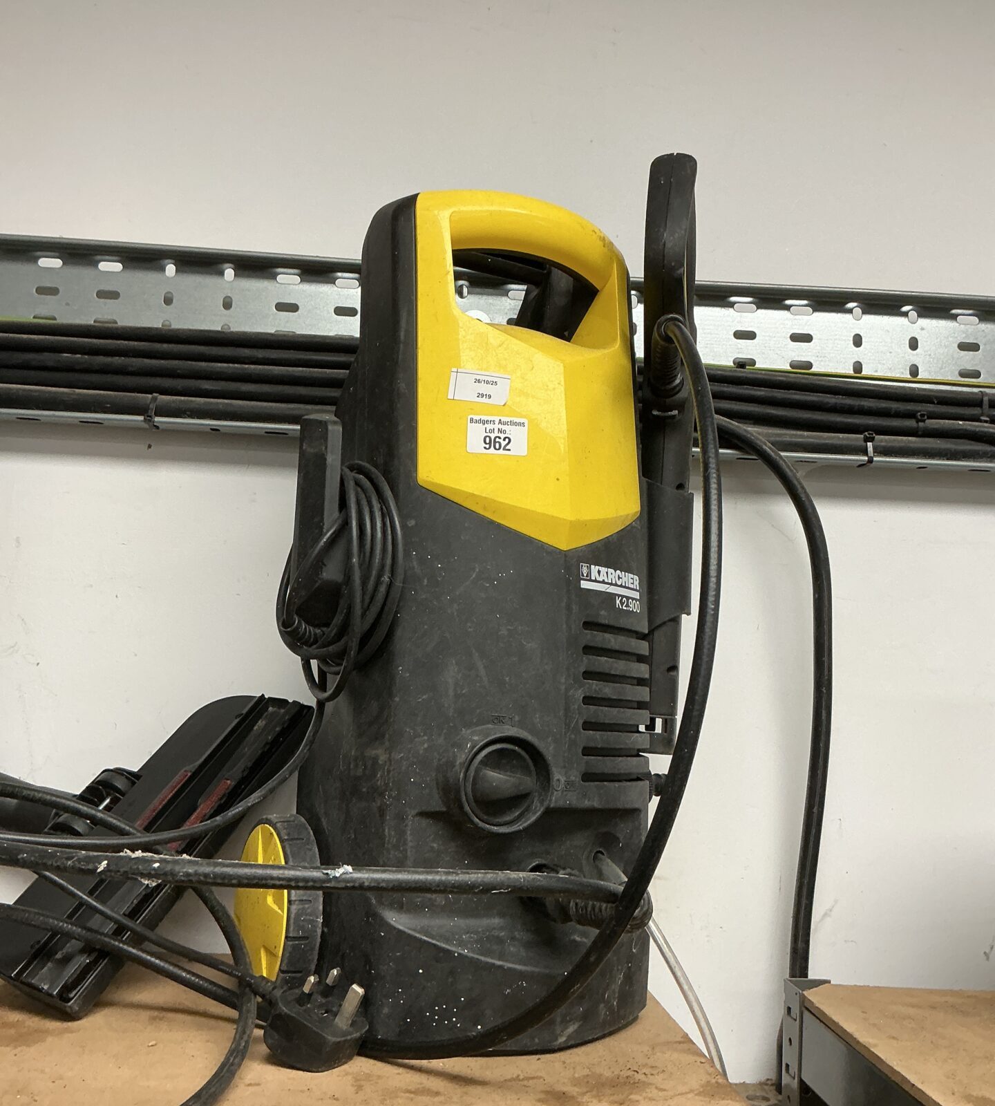 Front view of a used Karcher power washer for garden cleaning.