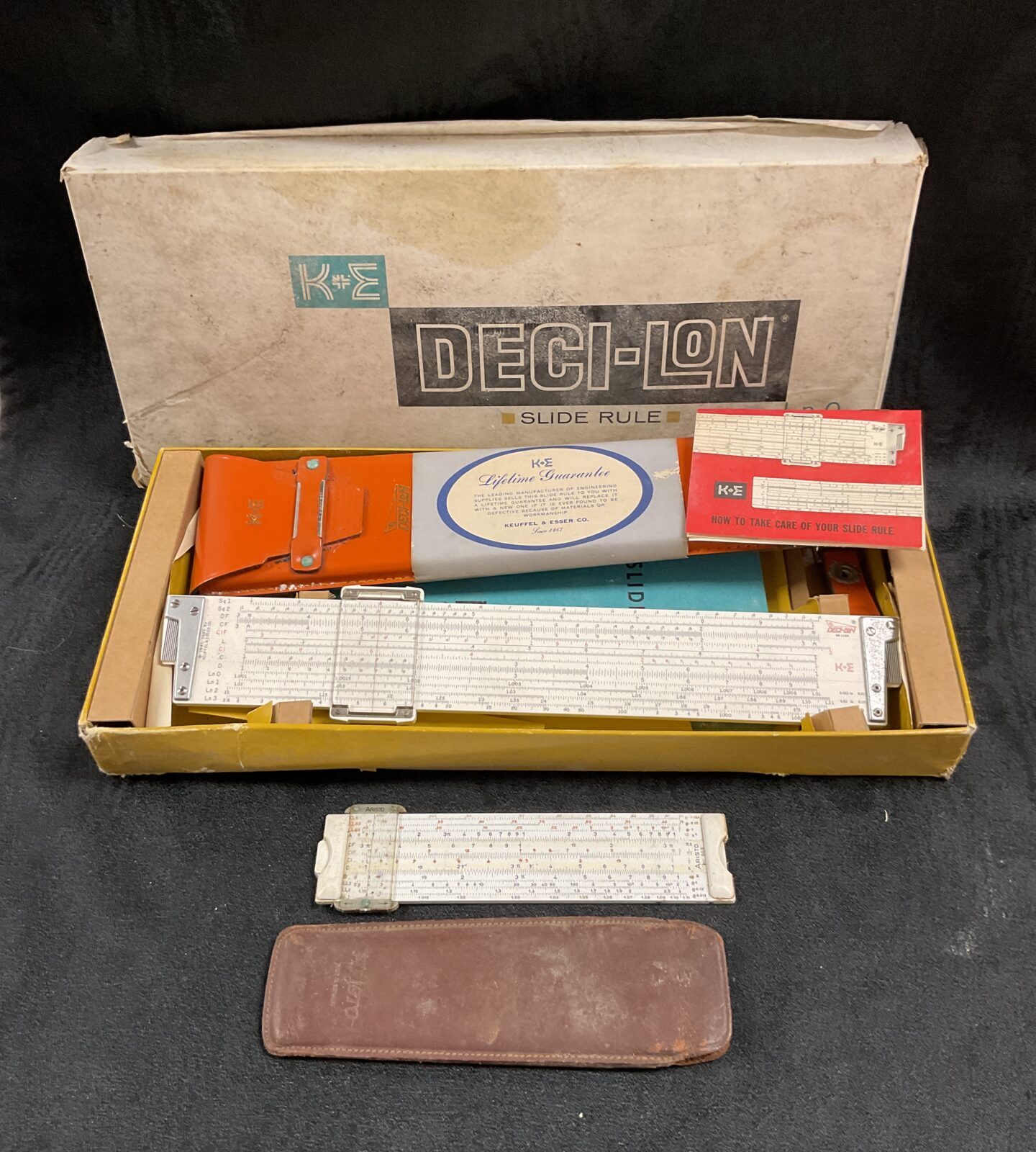 Vintage KEUFFEL & ESSEN Decilon slide rule in its original box.