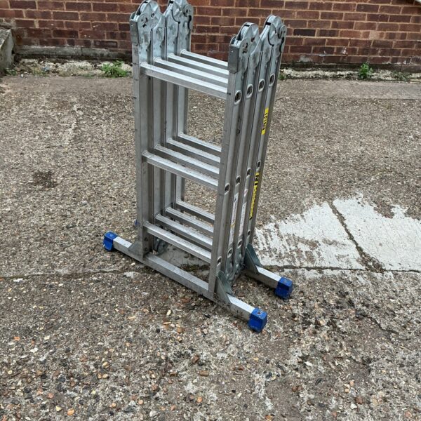 Silver Kingfisher multi-purpose aluminium ladder in a garden setting.