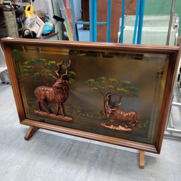 Vintage copper effect kudu fire guard for fireplace.