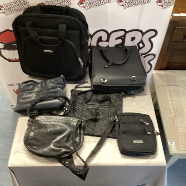 Lot of vintage ladies handbags and purses for sale.