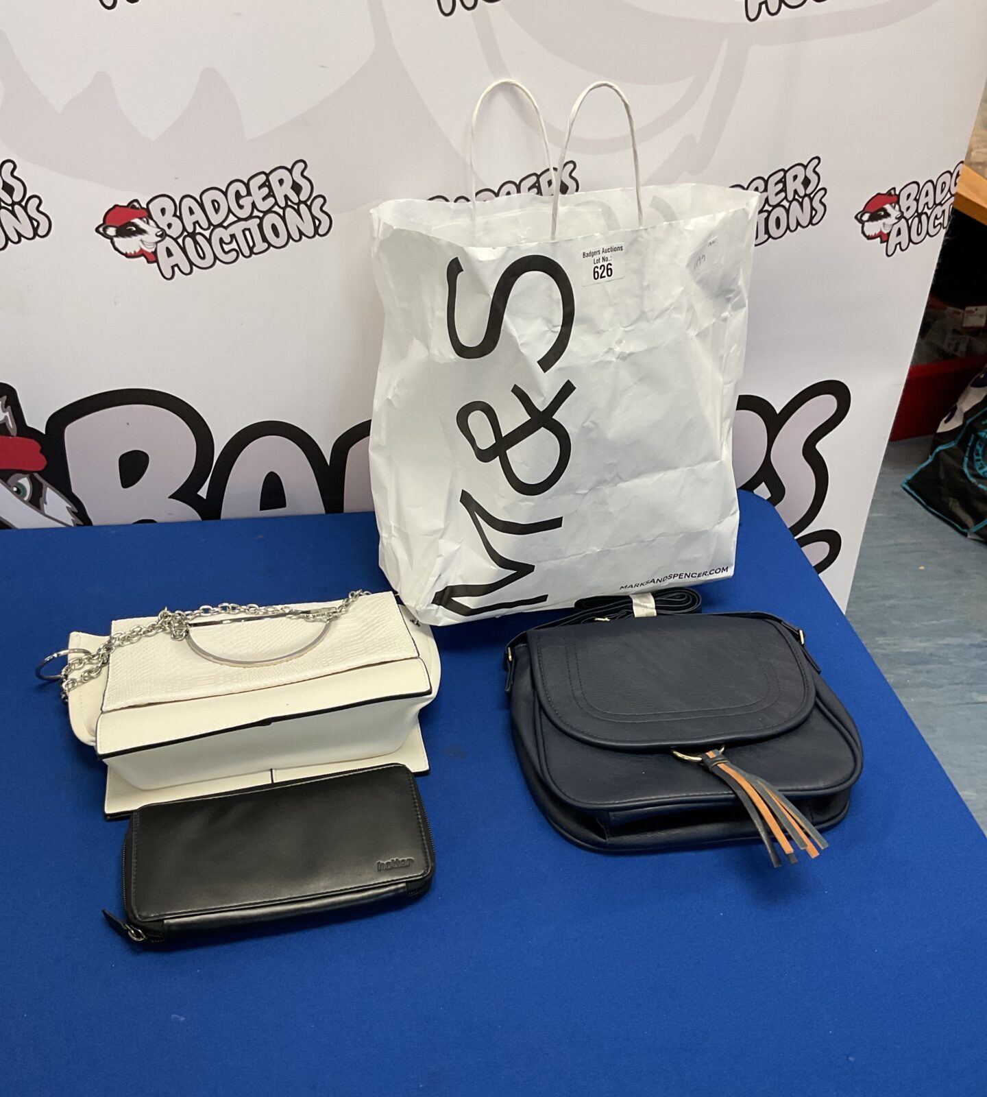 Ladies handbag lot with shoulder bags and purse.