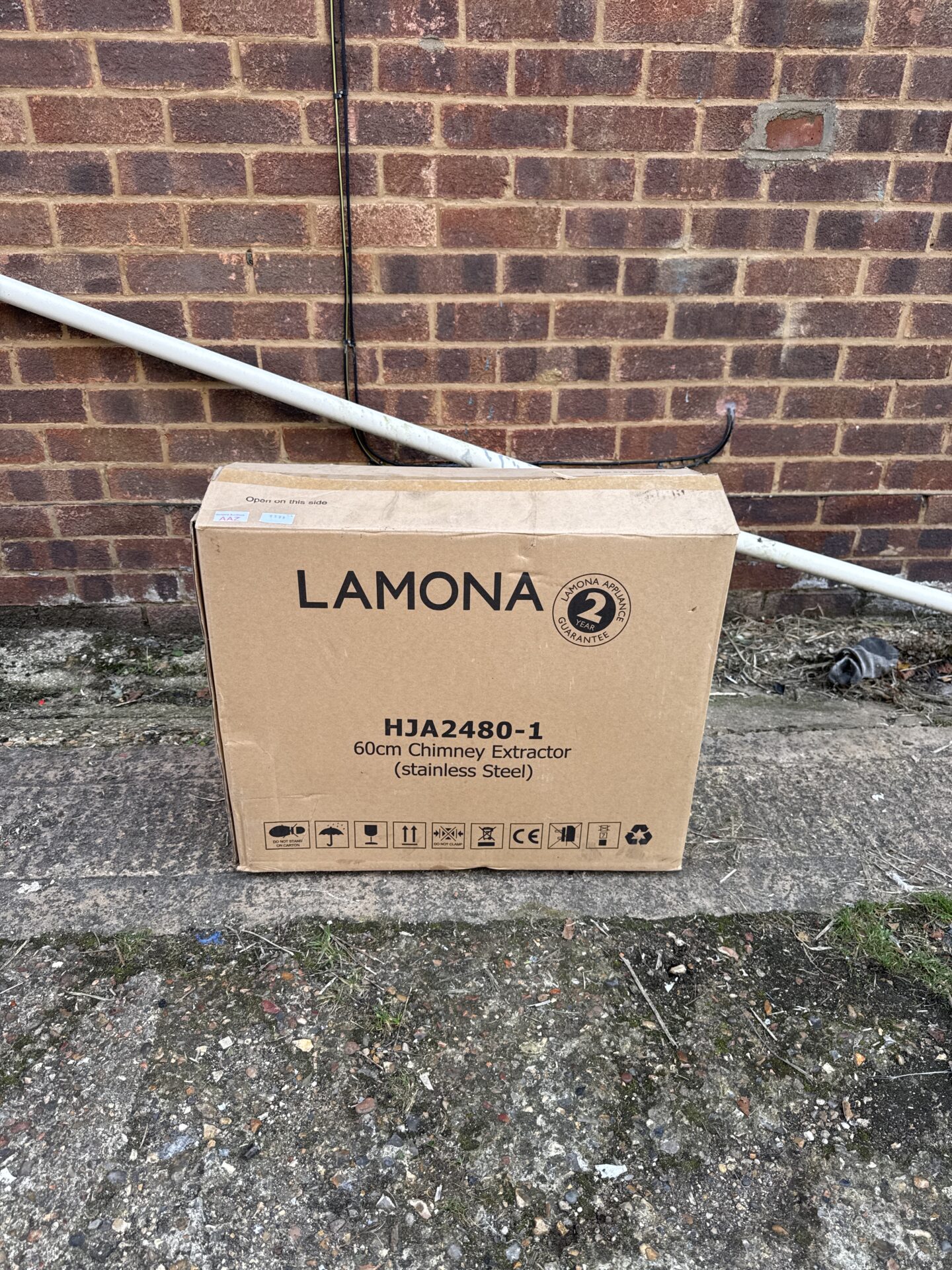 Lamona chimney extractor fan in original packaging.