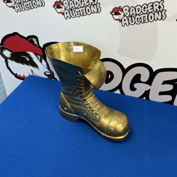 Large brass boot sculpture, vintage decorative item.