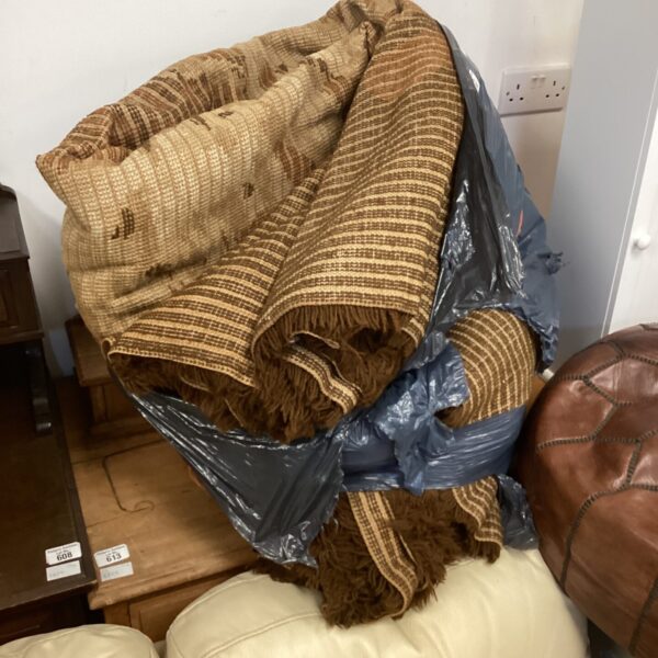 Large brown patterned rug for home decor and flooring.
