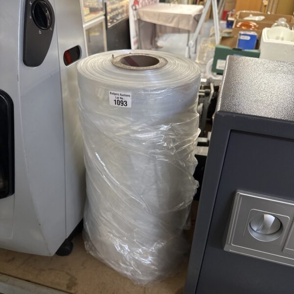 Large roll of heavy-duty carpet protector for floor protection.