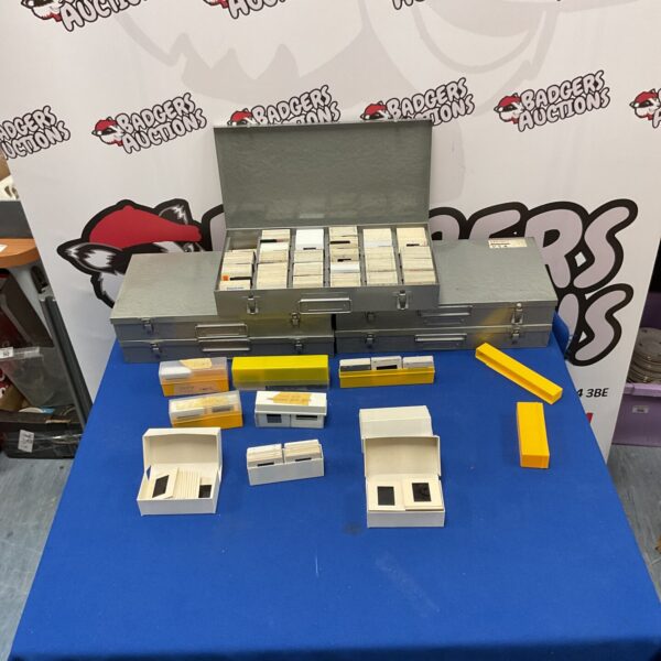 Large collection of vintage slide photos in cases.