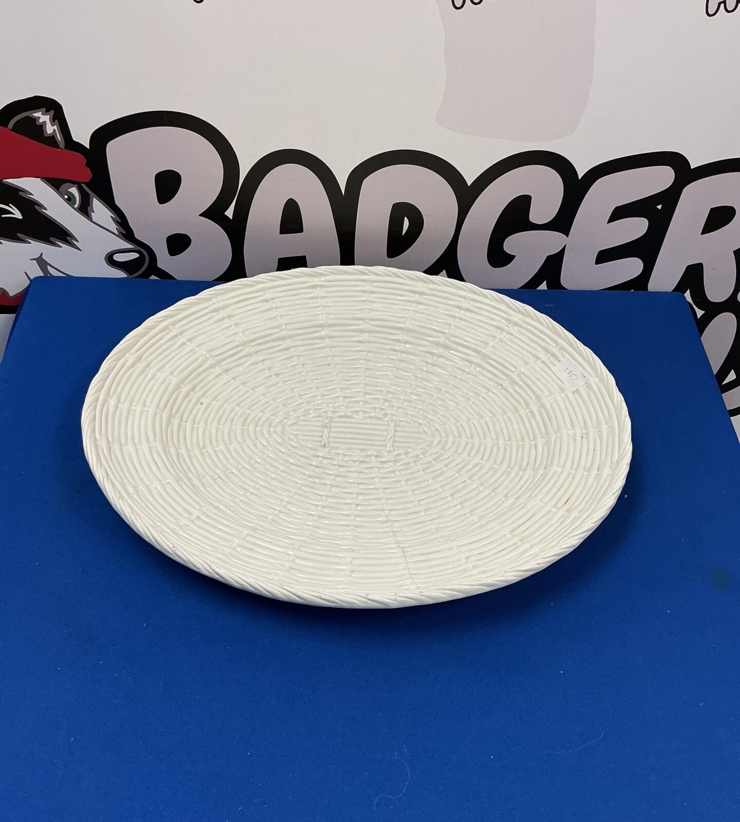 Large white porcelain serving plate for elegant dining.