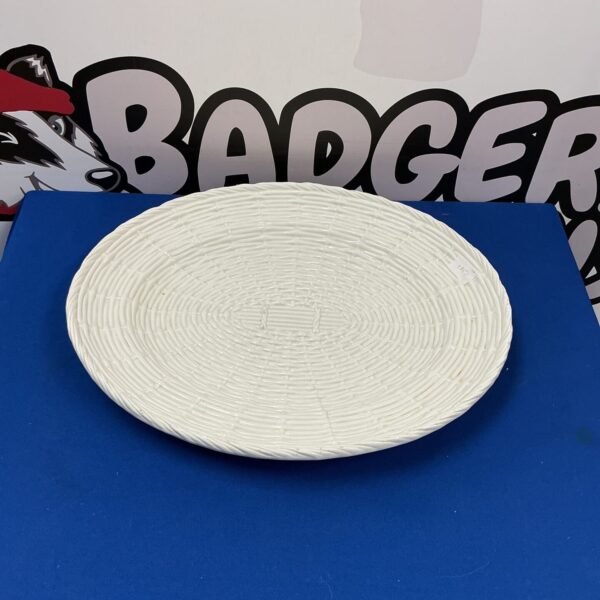 Large white porcelain serving plate for elegant dining.