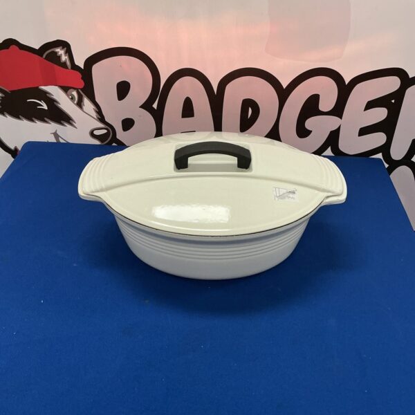 Vibrant red Le Creuset No. 33 casserole dish, classic French cookware.