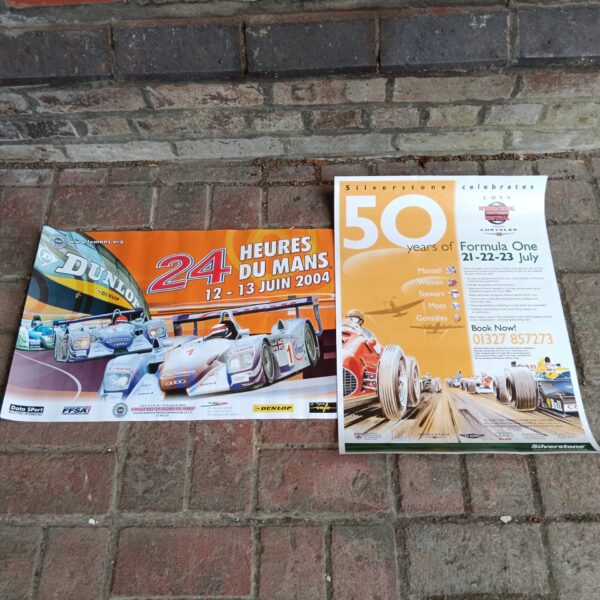 Vibrant Le Mans 2004 poster featuring racing cars.