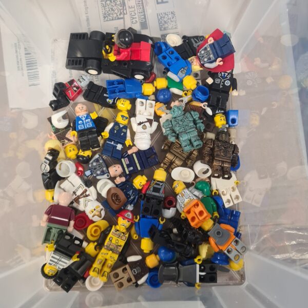 Bulk Lego minifigure lot including Ninjago figures for collectors.