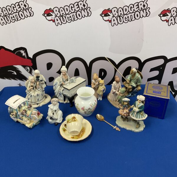 Leonardo Collection Skating Lesson figurine and Chinese Mudman ornament.