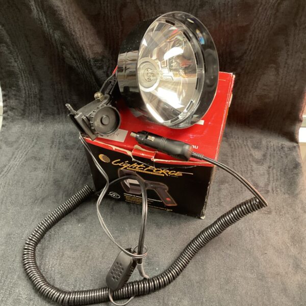 New Lightforce 12v spot lamp in original box, ideal for off-road vehicles.