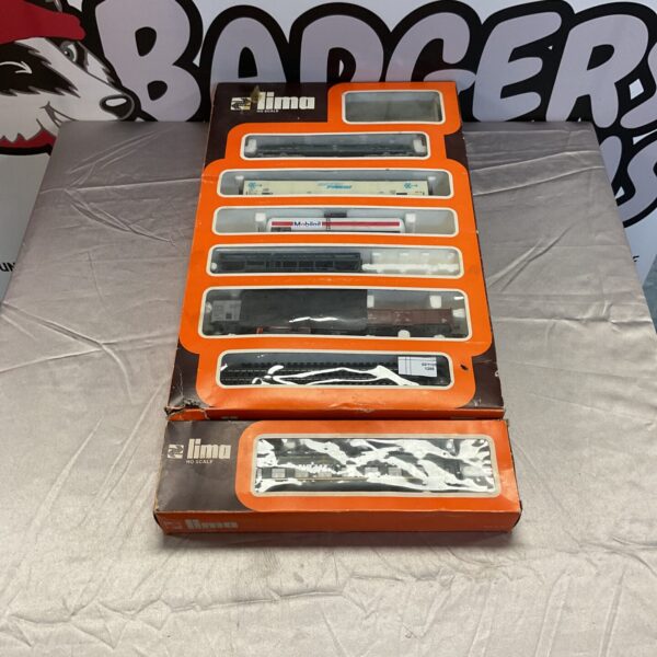 Vintage Lima Ho Scale model trains in original boxes.