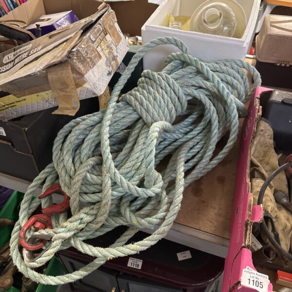 Thick white nylon rope coiled and ready for use.