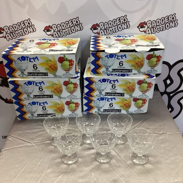 Six boxes of vintage Luminarc Totem bowls stacked together.