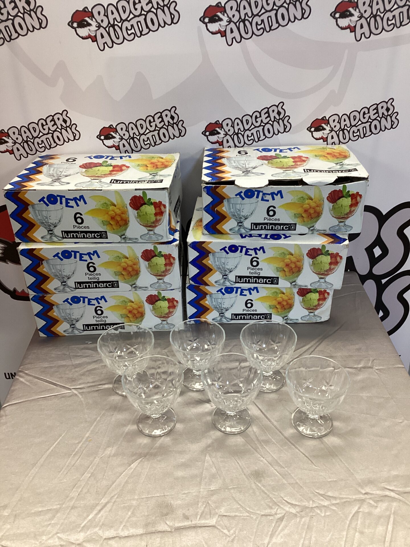 Six boxes of vintage Luminarc Totem bowls stacked together.