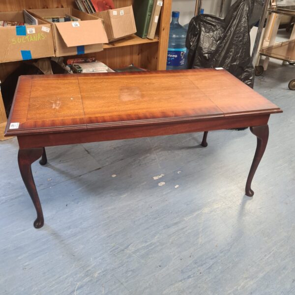 Front view of a dark mahogany gaming table with chess and backgammon boards.