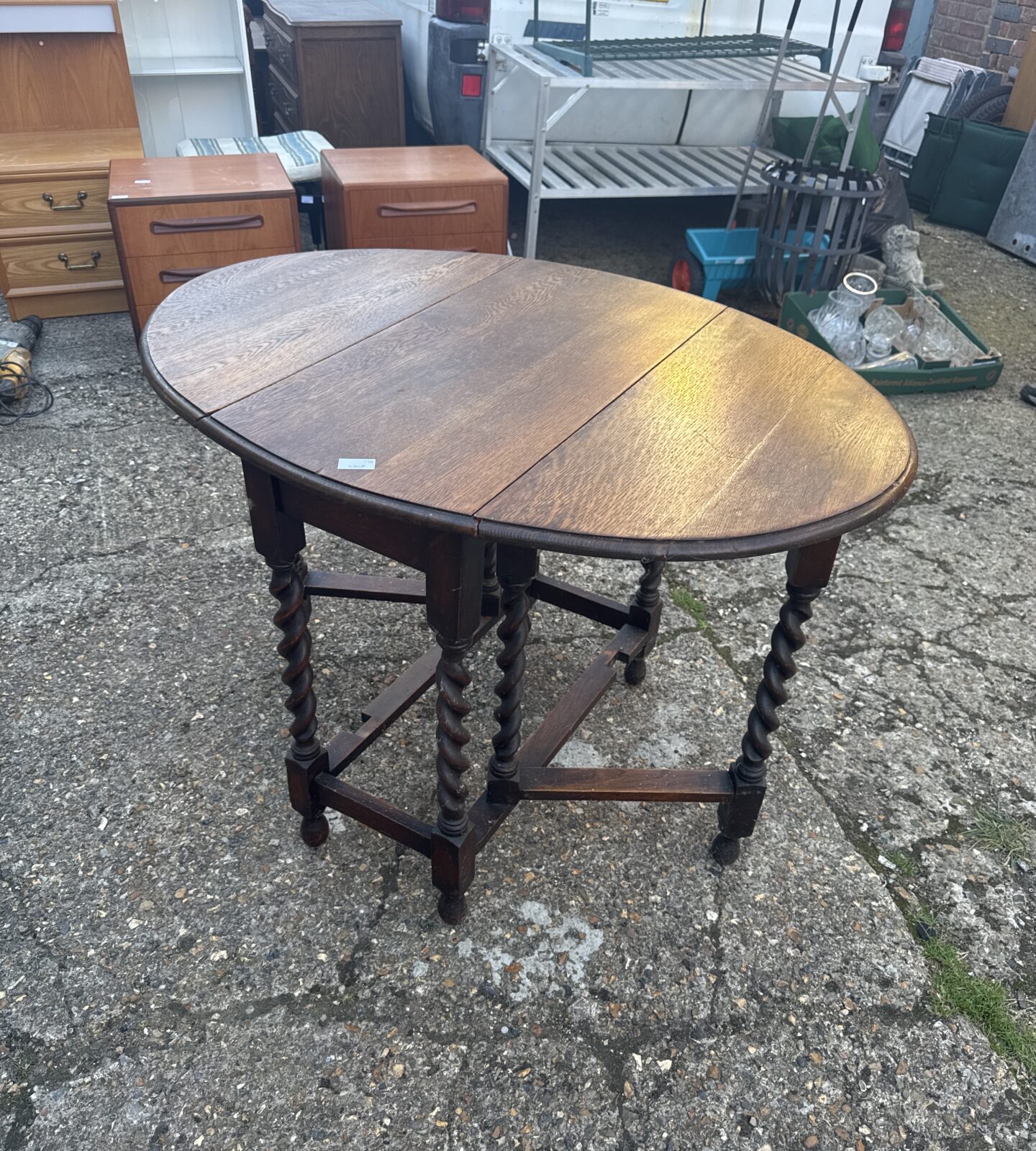 Vintage mahogany gate leg table with barley twist legs.