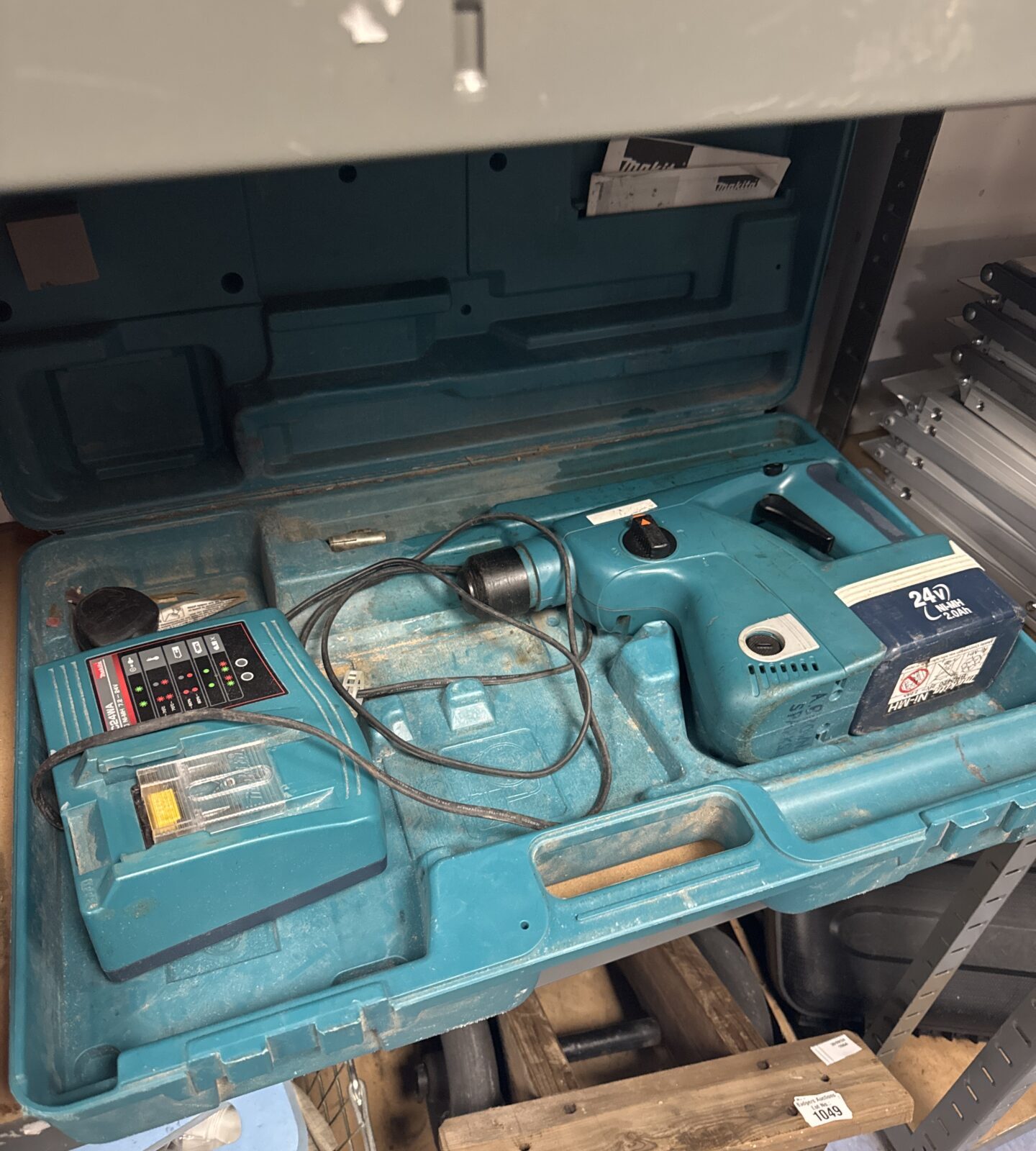 Vintage Makita cordless drill in open case.