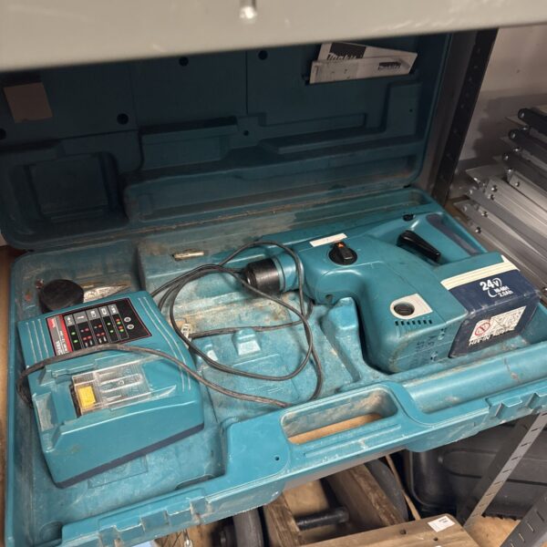 Vintage Makita cordless drill in open case.