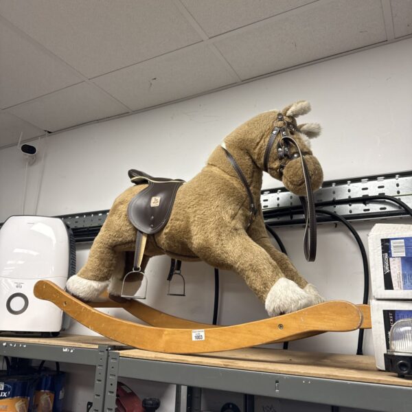 Vintage Mamas & Papas rocking horse in good condition.