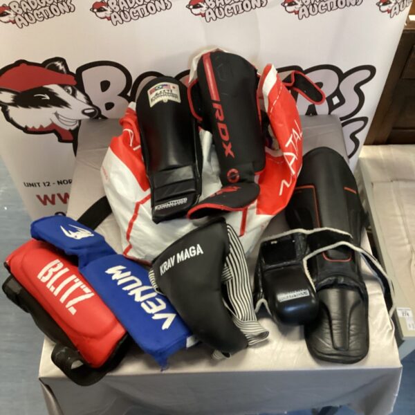 Lot of used martial arts sparring pads for boxing and kickboxing training.