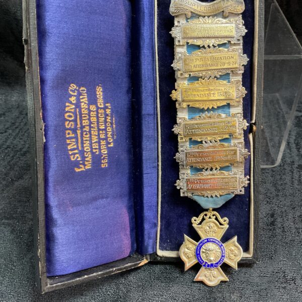 Antique silver masonic attendance jewel with bars, dating to 1924.