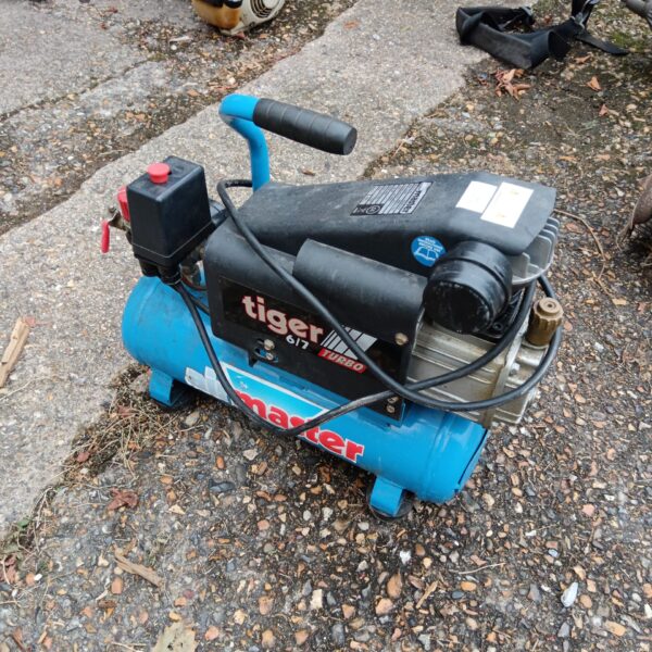 Portable Master Tiger 6/7 Turbo air compressor for workshop use.