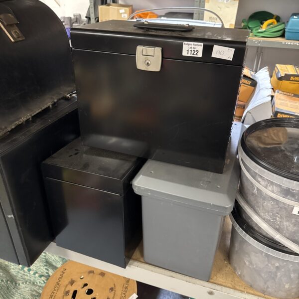 Lot of three metal document boxes for secure file storage.