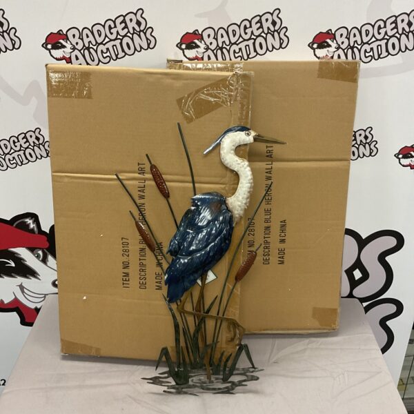 Detailed metal heron wall art sculpture for garden decor.