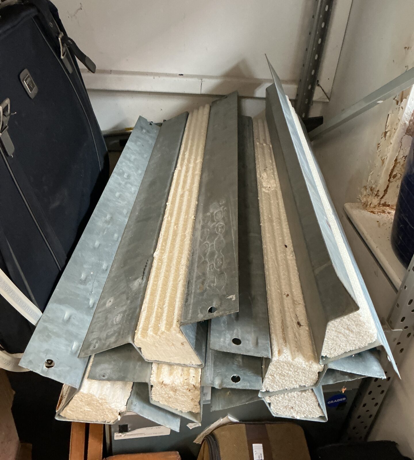 Lot of six metal lintels for construction and home improvement projects.