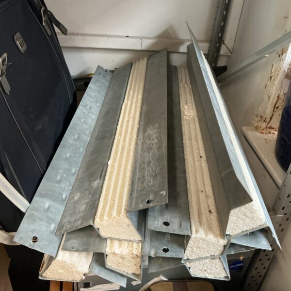 Lot of six metal lintels for construction and home improvement projects.