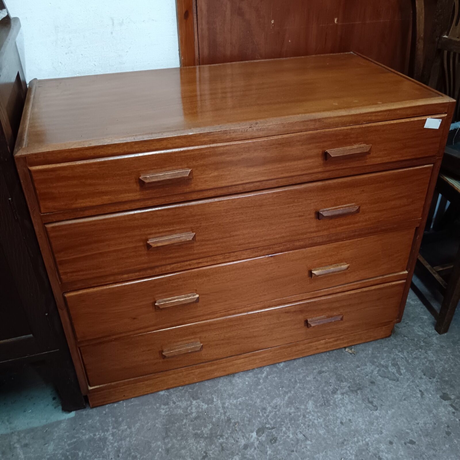 Vintage mid-century chest of drawers with four drawers.