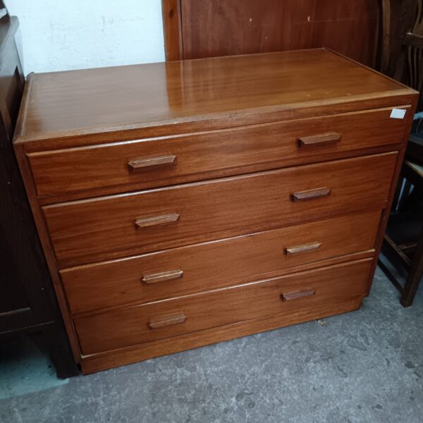 Vintage mid-century chest of drawers with four drawers.