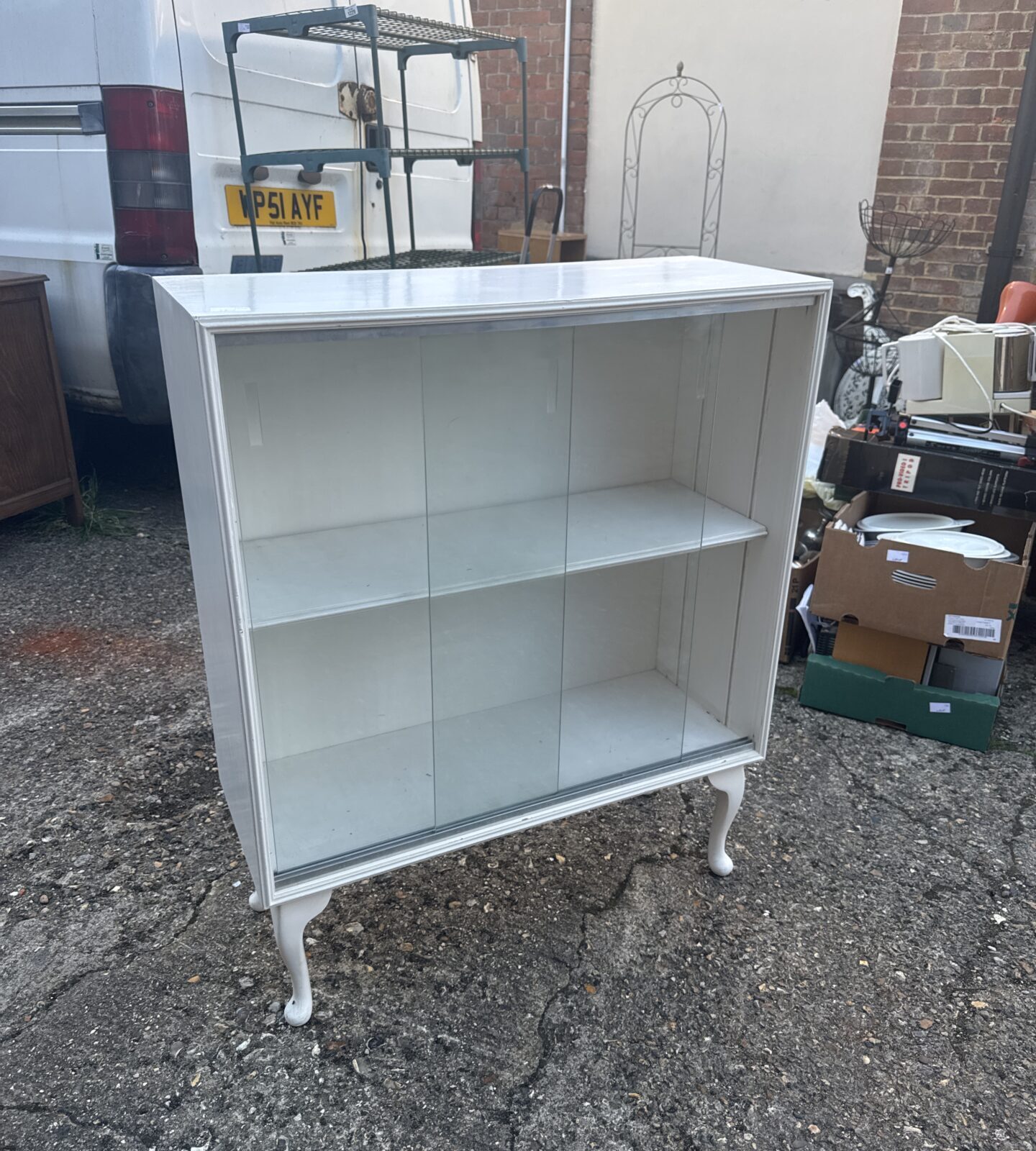 Vintage mid century display cabinet with glass doors.