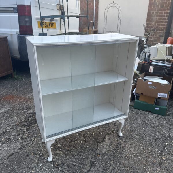 Vintage mid century display cabinet with glass doors.