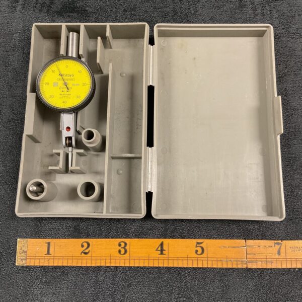 Mitutoyo depth micrometer with dial gauge for precise measurements.