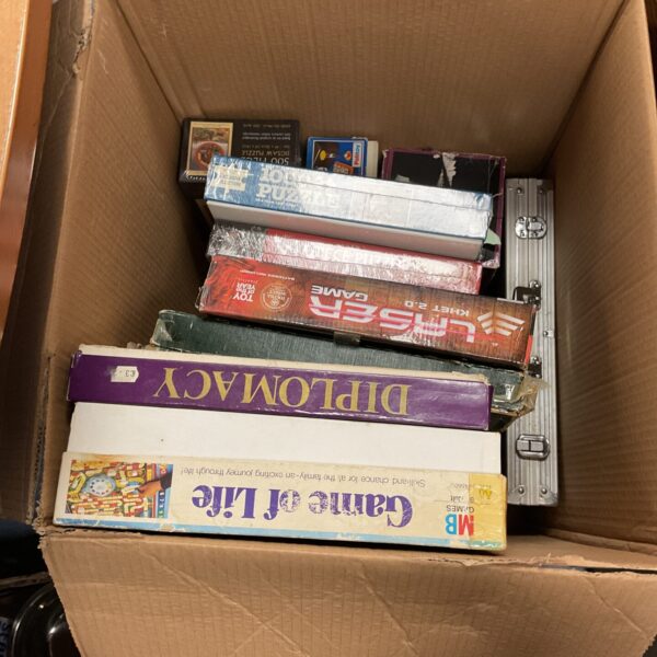 Large box of mixed board games including MB Games and Palitoy.