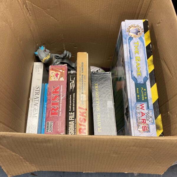 Mixed lot of board games including Risk and a new rugby ball.